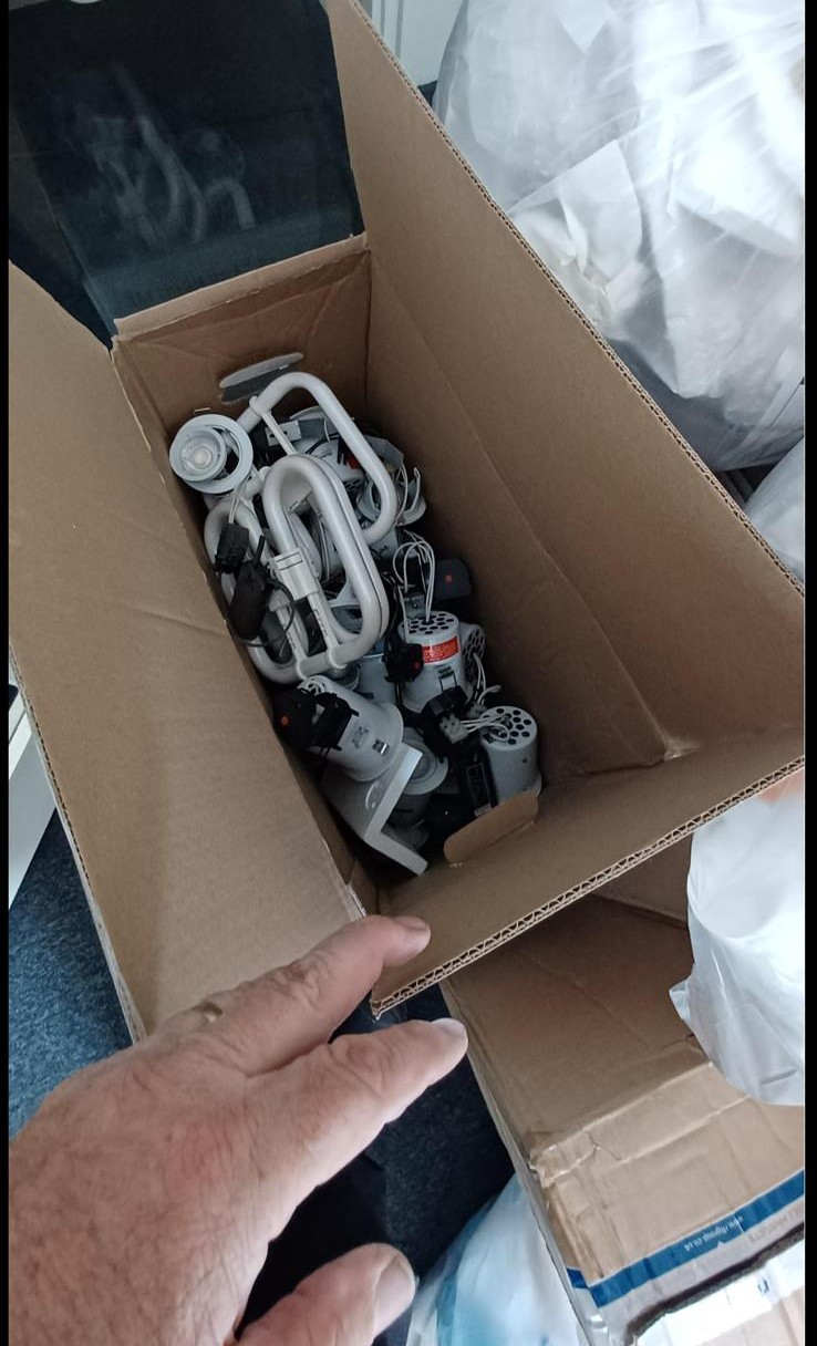 A box of old light fittings