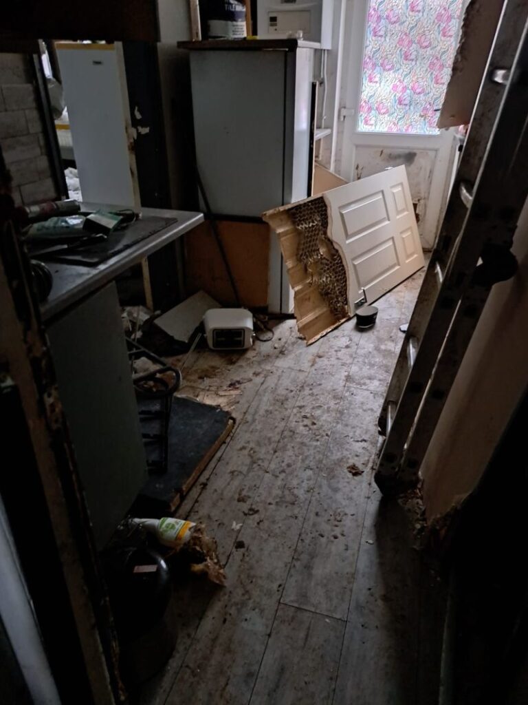A damaged kitchen at a void property in Stoke on Trent