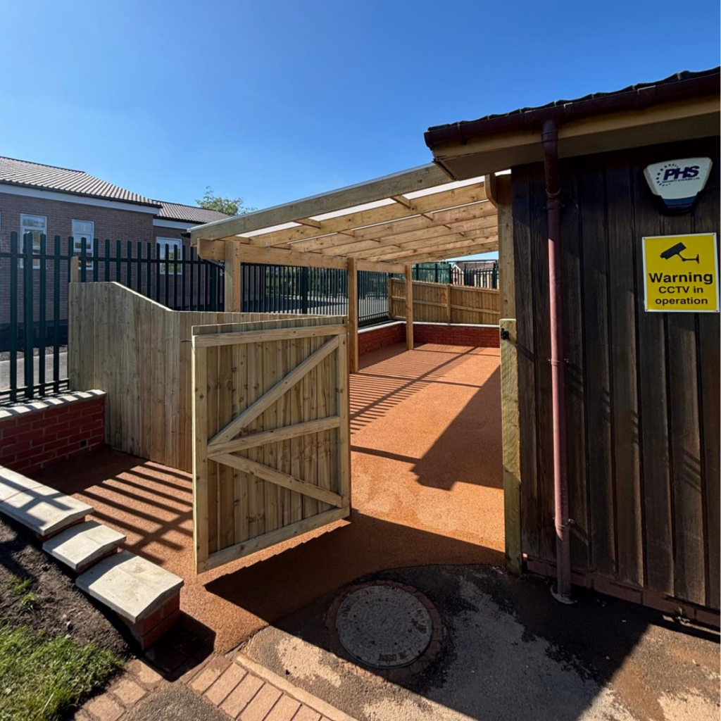 A new fence fitted at an outdoor classroom area.