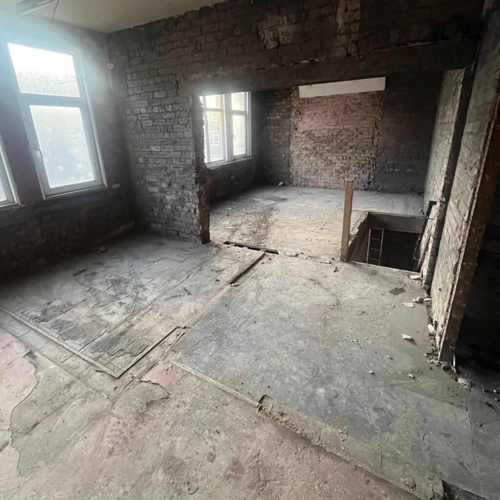 Back to brick soft strip demolition of a property interior