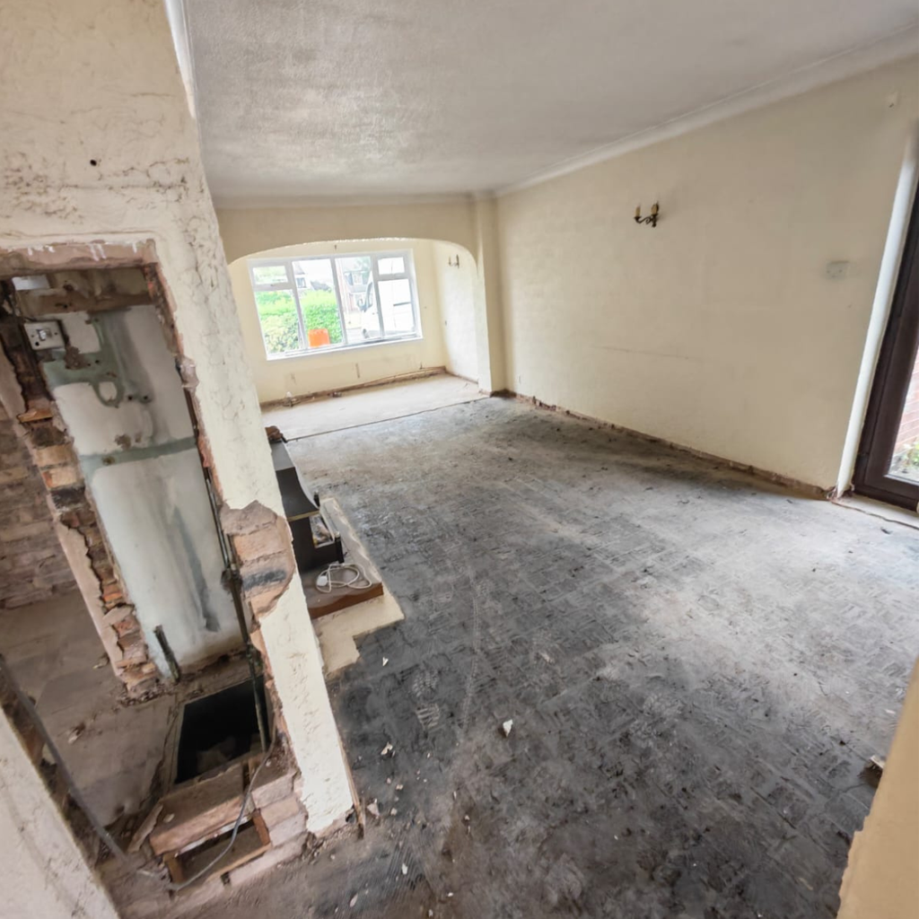 A room with the hardwood flooring removed
