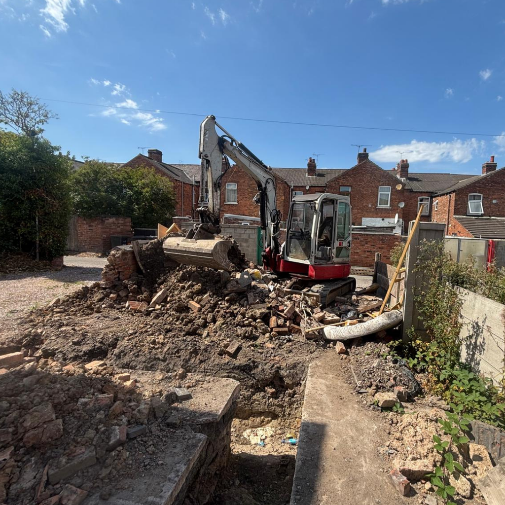 An excavator on a building site.